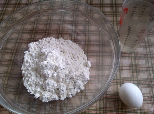 Tapioca flour and egg on table