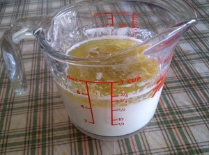 milk and oil in measuring cup