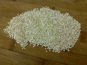 Quinoa grains on chopping board