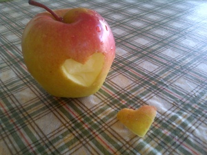 apple with cutout heart