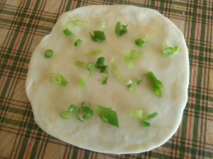 Green onion on yeast dough