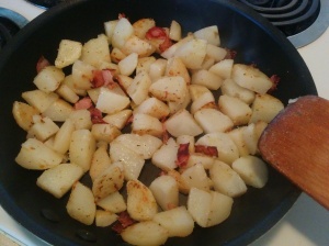 pan frying potatoes in pan