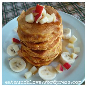 stack of pumpkin pancakes with maple syrup